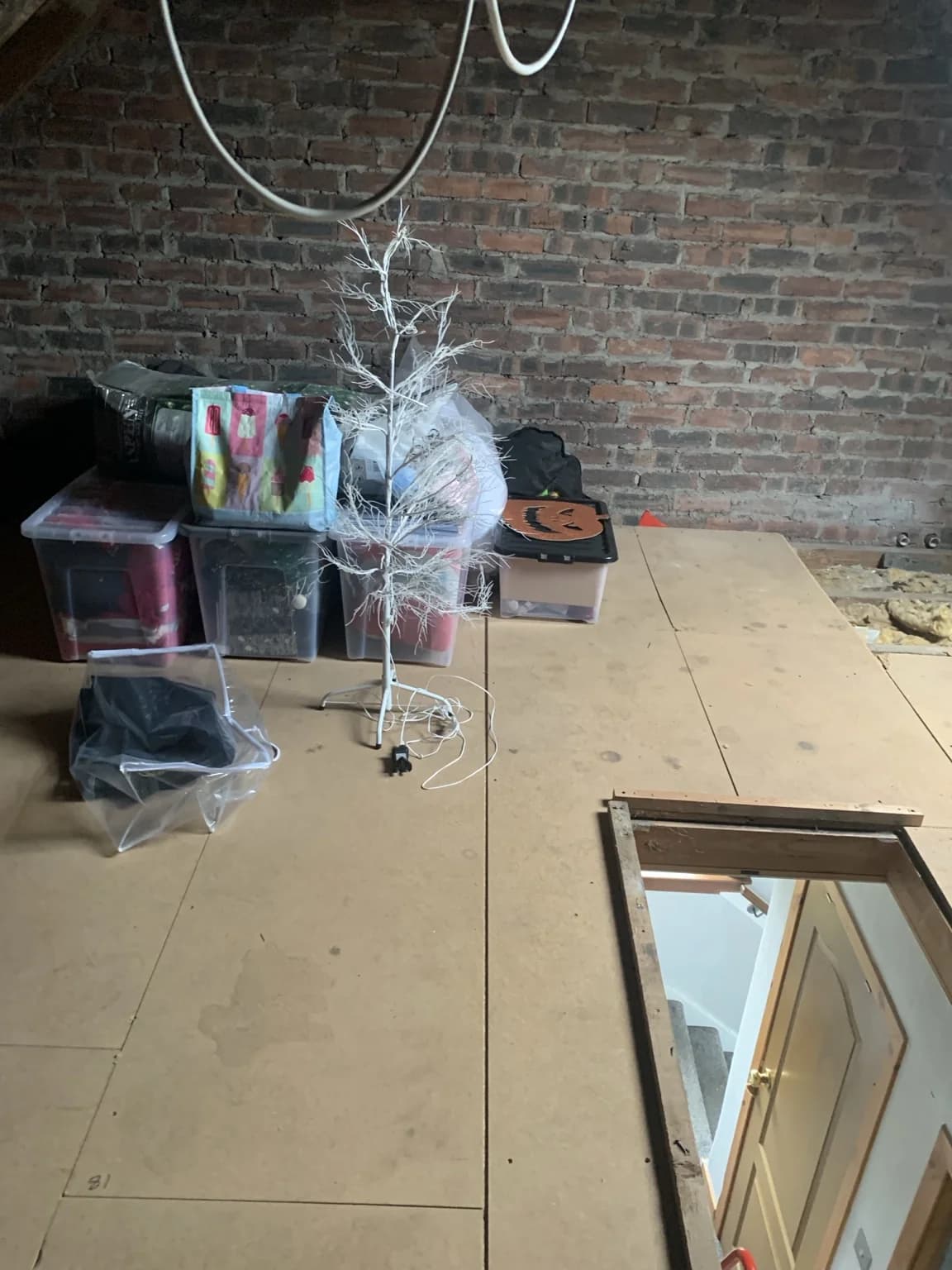 Kilwinning loft with old boarding before the insulation and boarding replacement